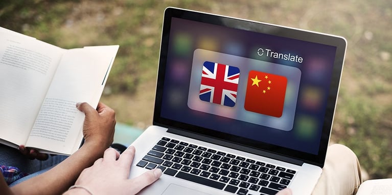computer on webpage translating english to chinese