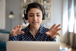 Woman interpreting through video